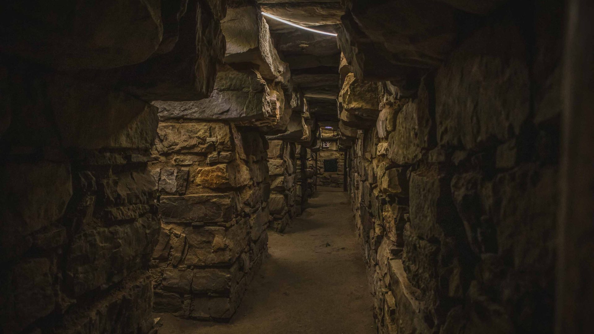 The dark interior of an archeological site.
