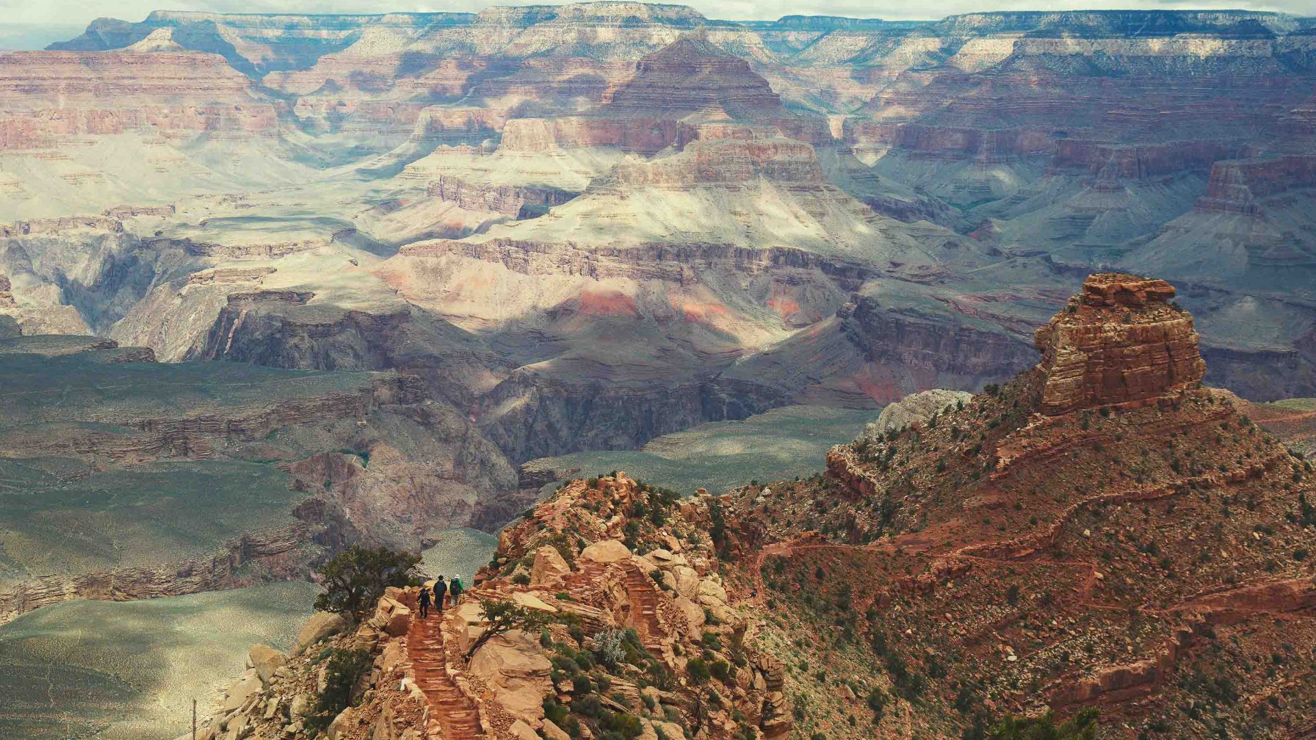 The rock formations and valleys of a canyon.